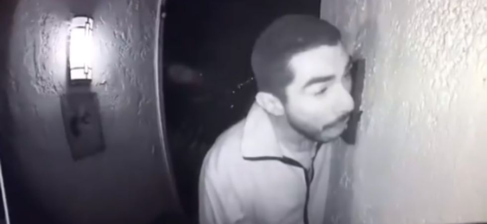 Video of a man licking doorbell for three hours is